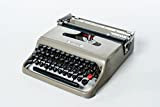Macchina da scrivere portatile Lettera 22 Olivetti 1950 funzionante grigia e nera